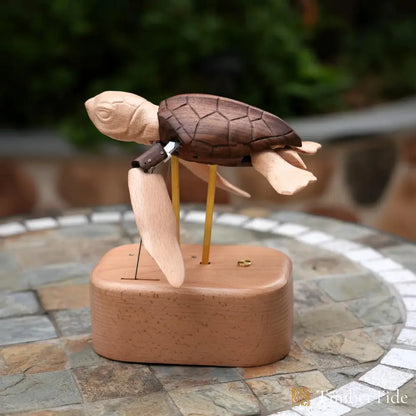 Wooden sea turtle automaton flipper motion detail